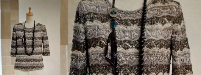 Au tricot un pull délicatement ajouré